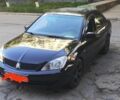 Мицубиси Лансер 2005 в Южноукраинске на Automoto.ua Черный Мицубиси Лансер, объемом двигателя 1.6 л и пробегом 350 тыс. км за 3099 $, фото 1 на Automoto.ua