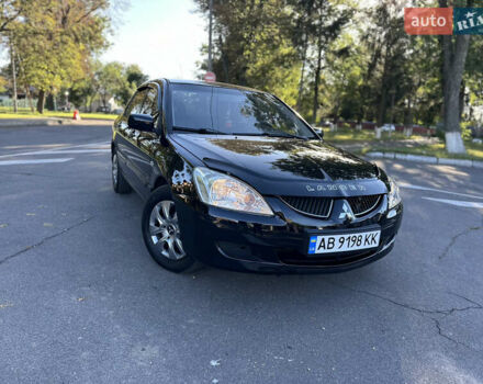 Мицубиси Лансер 2005 в Виннице на Automoto.ua Черный Мицубиси Лансер, объемом двигателя 1.6 л и пробегом 261 тыс. км за 4100 $, фото 17 на Automoto.ua