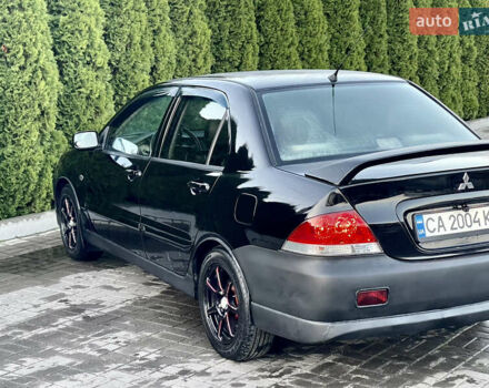 Мицубиси Лансер 2005 в Черкассах на Automoto.ua Черный Мицубиси Лансер, объемом двигателя 1.58 л и пробегом 368 тыс. км за 4400 $, фото 19 на Automoto.ua