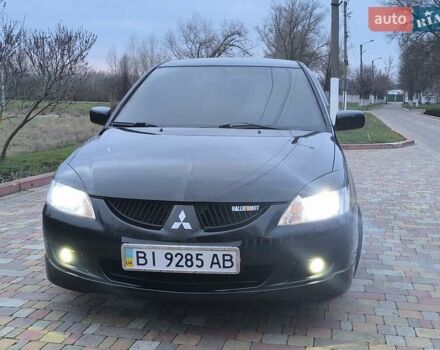 Чорний Міцубісі Lancer, об'ємом двигуна 1.58 л та пробігом 263 тис. км за 4500 $, фото 21 на Automoto.ua