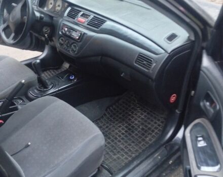 Чорний Міцубісі Lancer, об'ємом двигуна 1.6 л та пробігом 211 тис. км за 3700 $, фото 2 на Automoto.ua
