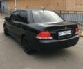 Черный Мицубиси Лансер, объемом двигателя 1.6 л и пробегом 250 тыс. км за 3100 $, фото 3 на Automoto.ua