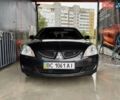 Черный Мицубиси Лансер, объемом двигателя 1.58 л и пробегом 249 тыс. км за 5000 $, фото 9 на Automoto.ua