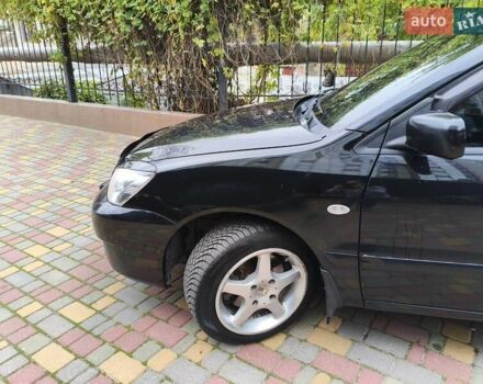 Мицубиси Лансер 2005 в Одессе на Automoto.ua Черный Мицубиси Лансер, объемом двигателя 1.58 л и пробегом 206 тыс. км за 3900 $, фото 1 на Automoto.ua