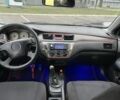 Черный Мицубиси Лансер, объемом двигателя 1.6 л и пробегом 390 тыс. км за 4000 $, фото 7 на Automoto.ua