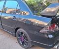 Чорний Міцубісі Lancer, об'ємом двигуна 2 л та пробігом 342 тис. км за 5000 $, фото 8 на Automoto.ua