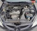 Міцубісі Lancer 2005 у Запоріжжя на Automoto.ua Чорний Міцубісі Lancer, об'ємом двигуна 1.58 л та пробігом 186 тис. км за 4700 $, фото 8 на Automoto.ua