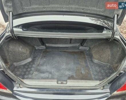 Черный Мицубиси Лансер, объемом двигателя 1.58 л и пробегом 280 тыс. км за 3200 $, фото 13 на Automoto.ua