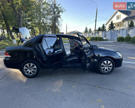 Мицубиси Лансер 2005 в Виннице на Automoto.ua Черный Мицубиси Лансер, объемом двигателя 1.6 л и пробегом 261 тыс. км за 4100 $, фото 60 на Automoto.ua