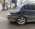 Черный Мицубиси Лансер, объемом двигателя 2 л и пробегом 275 тыс. км за 2599 $, фото 2 на Automoto.ua