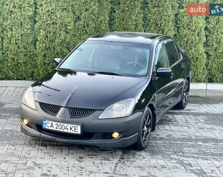 Мицубиси Лансер 2005 в Черкассах на Automoto.ua Черный Мицубиси Лансер, объемом двигателя 1.58 л и пробегом 368 тыс. км за 4400 $, фото 6 на Automoto.ua