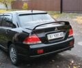 Чорний Міцубісі Lancer, об'ємом двигуна 1.6 л та пробігом 261 тис. км за 4400 $, фото 5 на Automoto.ua
