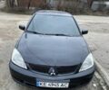 Чорний Міцубісі Lancer, об'ємом двигуна 1.6 л та пробігом 250 тис. км за 3500 $, фото 7 на Automoto.ua
