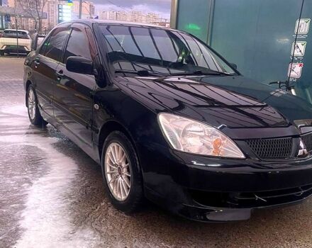 Чорний Міцубісі Lancer, об'ємом двигуна 1.6 л та пробігом 200 тис. км за 4000 $, фото 2 на Automoto.ua