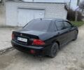 Чорний Міцубісі Lancer, об'ємом двигуна 1.6 л та пробігом 250 тис. км за 3500 $, фото 1 на Automoto.ua