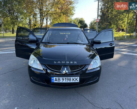 Мицубиси Лансер 2005 в Виннице на Automoto.ua Черный Мицубиси Лансер, объемом двигателя 1.6 л и пробегом 261 тыс. км за 4100 $, фото 58 на Automoto.ua