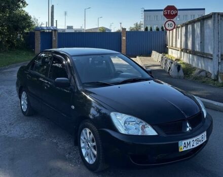 Чорний Міцубісі Lancer, об'ємом двигуна 1.6 л та пробігом 1 тис. км за 1750 $, фото 1 на Automoto.ua