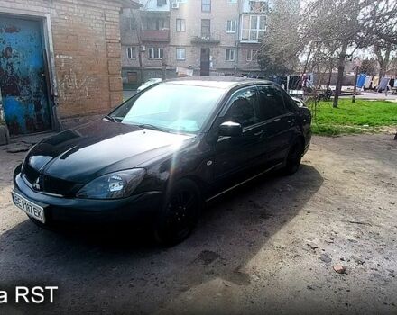 Чорний Міцубісі Lancer, об'ємом двигуна 2 л та пробігом 265 тис. км за 4000 $, фото 2 на Automoto.ua