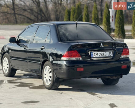 Чорний Міцубісі Lancer, об'ємом двигуна 1.6 л та пробігом 205 тис. км за 3650 $, фото 1 на Automoto.ua