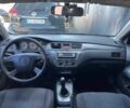 Чорний Міцубісі Lancer, об'ємом двигуна 2 л та пробігом 310 тис. км за 4990 $, фото 12 на Automoto.ua