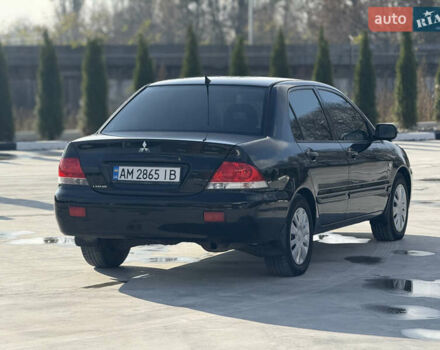 Чорний Міцубісі Lancer, об'ємом двигуна 1.6 л та пробігом 205 тис. км за 3650 $, фото 3 на Automoto.ua