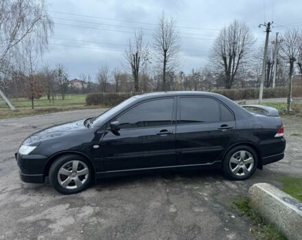 Чорний Міцубісі Lancer, об'ємом двигуна 1.6 л та пробігом 154 тис. км за 5500 $, фото 4 на Automoto.ua