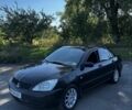 Чорний Міцубісі Lancer, об'ємом двигуна 1.6 л та пробігом 1 тис. км за 1750 $, фото 1 на Automoto.ua