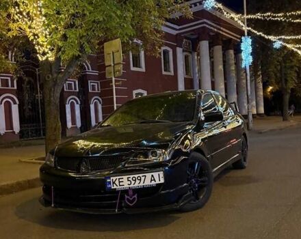 Чорний Міцубісі Lancer, об'ємом двигуна 2 л та пробігом 342 тис. км за 5000 $, фото 5 на Automoto.ua
