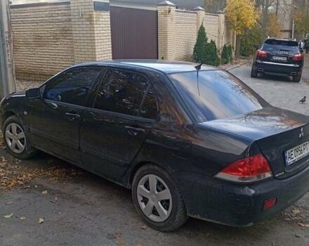 Чорний Міцубісі Lancer, об'ємом двигуна 1.6 л та пробігом 211 тис. км за 3700 $, фото 5 на Automoto.ua