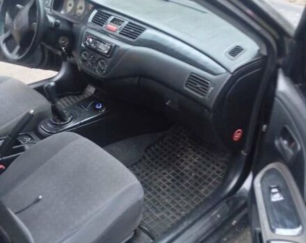 Чорний Міцубісі Lancer, об'ємом двигуна 1.6 л та пробігом 211 тис. км за 3700 $, фото 1 на Automoto.ua