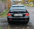 Чорний Міцубісі Lancer, об'ємом двигуна 1.6 л та пробігом 261 тис. км за 4400 $, фото 4 на Automoto.ua