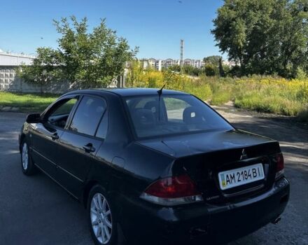 Чорний Міцубісі Lancer, об'ємом двигуна 1.6 л та пробігом 1 тис. км за 1750 $, фото 3 на Automoto.ua