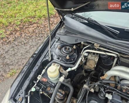 Черный Мицубиси Лансер, объемом двигателя 1.58 л и пробегом 280 тыс. км за 3200 $, фото 16 на Automoto.ua