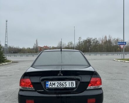 Черный Мицубиси Лансер, объемом двигателя 1.6 л и пробегом 200 тыс. км за 3500 $, фото 4 на Automoto.ua