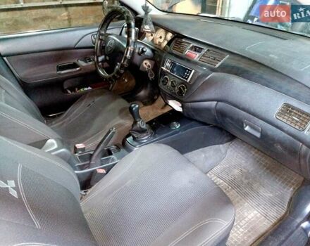 Чорний Міцубісі Lancer, об'ємом двигуна 1.58 л та пробігом 294 тис. км за 3800 $, фото 5 на Automoto.ua
