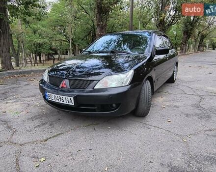 Черный Мицубиси Лансер, объемом двигателя 1.58 л и пробегом 352 тыс. км за 4000 $, фото 5 на Automoto.ua