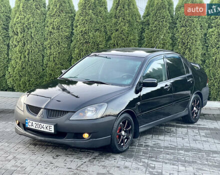 Мицубиси Лансер 2005 в Черкассах на Automoto.ua Черный Мицубиси Лансер, объемом двигателя 1.58 л и пробегом 368 тыс. км за 4400 $, фото 5 на Automoto.ua