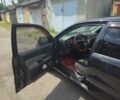 Черный Мицубиси Лансер, объемом двигателя 1.58 л и пробегом 284 тыс. км за 4699 $, фото 1 на Automoto.ua