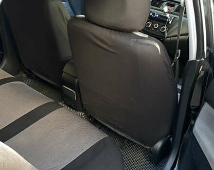 Черный Мицубиси Лансер, объемом двигателя 1.6 л и пробегом 200 тыс. км за 3000 $, фото 7 на Automoto.ua