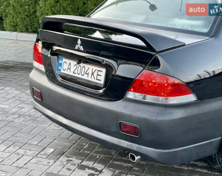 Мицубиси Лансер 2005 в Черкассах на Automoto.ua Черный Мицубиси Лансер, объемом двигателя 1.58 л и пробегом 368 тыс. км за 4400 $, фото 22 на Automoto.ua
