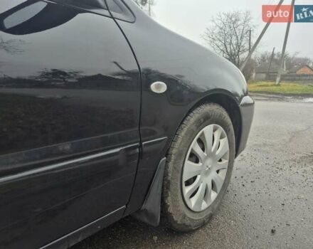 Черный Мицубиси Лансер, объемом двигателя 1.58 л и пробегом 280 тыс. км за 3200 $, фото 7 на Automoto.ua