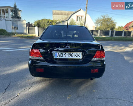 Мицубиси Лансер 2005 в Виннице на Automoto.ua Черный Мицубиси Лансер, объемом двигателя 1.6 л и пробегом 261 тыс. км за 4100 $, фото 7 на Automoto.ua