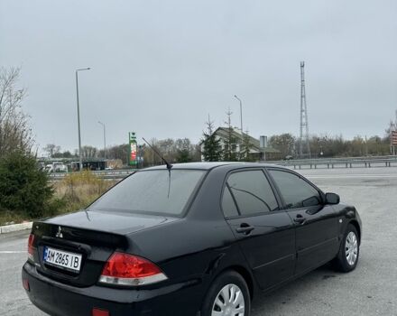 Черный Мицубиси Лансер, объемом двигателя 1.6 л и пробегом 200 тыс. км за 3500 $, фото 6 на Automoto.ua