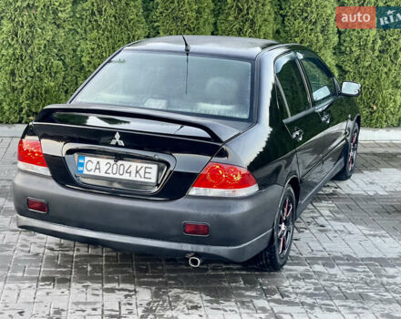 Мицубиси Лансер 2005 в Черкассах на Automoto.ua Черный Мицубиси Лансер, объемом двигателя 1.58 л и пробегом 368 тыс. км за 4400 $, фото 15 на Automoto.ua