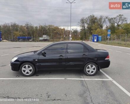 Міцубісі Lancer 2005 у Запоріжжя на Automoto.ua Чорний Міцубісі Lancer, об'ємом двигуна 1.58 л та пробігом 186 тис. км за 4700 $, фото 3 на Automoto.ua