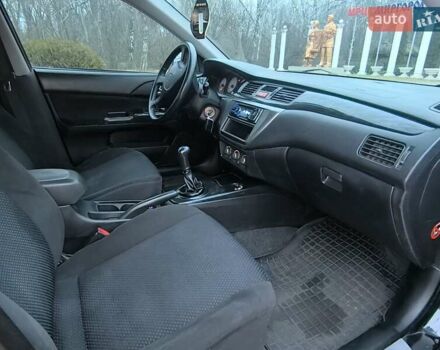 Чорний Міцубісі Lancer, об'ємом двигуна 1.58 л та пробігом 263 тис. км за 4500 $, фото 10 на Automoto.ua