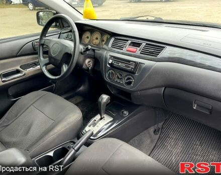 Чорний Міцубісі Lancer, об'ємом двигуна 1.6 л та пробігом 250 тис. км за 3700 $, фото 10 на Automoto.ua