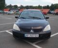 Чорний Міцубісі Lancer, об'ємом двигуна 1.6 л та пробігом 240 тис. км за 3900 $, фото 1 на Automoto.ua