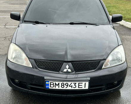 Черный Мицубиси Лансер, объемом двигателя 1.58 л и пробегом 300 тыс. км за 3850 $, фото 2 на Automoto.ua