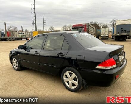 Чорний Міцубісі Lancer, об'ємом двигуна 1.6 л та пробігом 250 тис. км за 3700 $, фото 2 на Automoto.ua